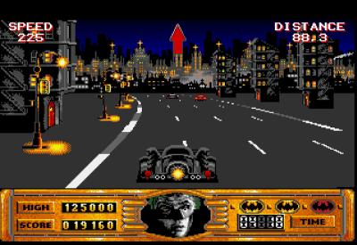Es geht mit dem Batmobil durch viel Verkehr.