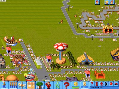 Der Turm im Park gibt dem Besucher einen schönen Überblick. Im Hintergrund sehen wir unsere etwas größere Kartbahn und eine Aushilfe, welche fleißig den Rasen mäht.